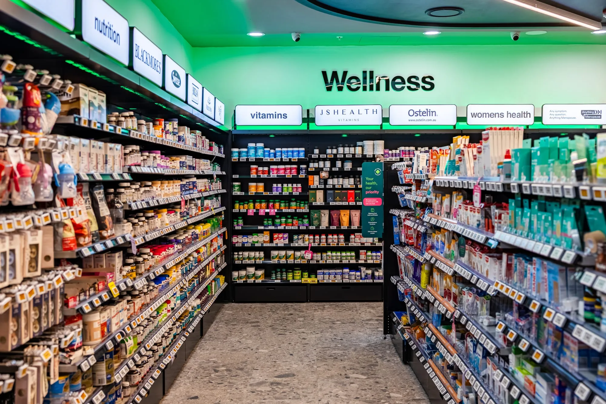 Wide retail aisle beneath a coffered feature ceiling