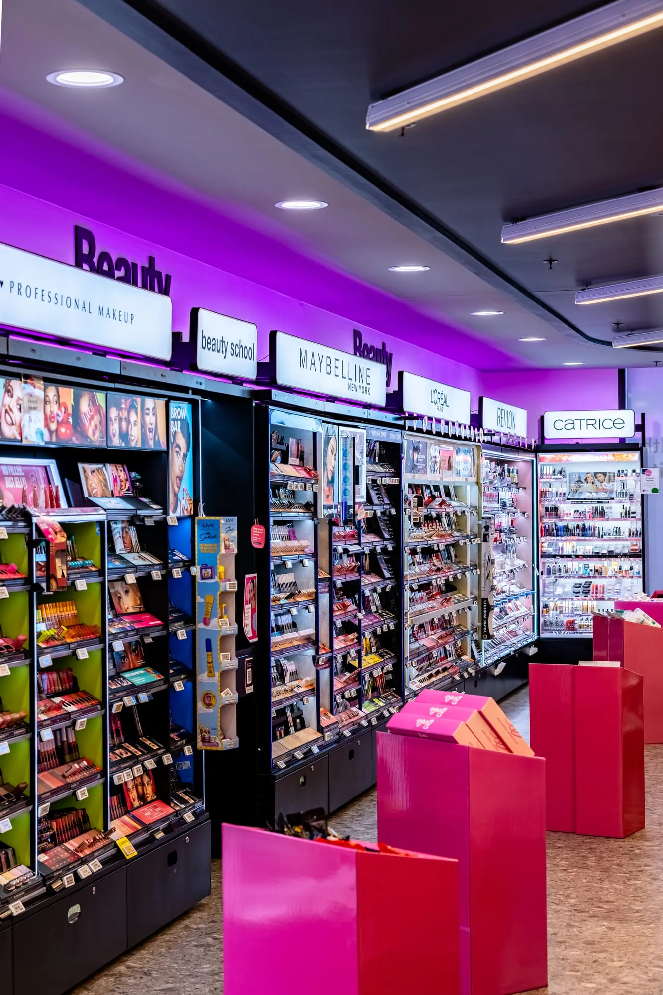 Beauty department beneath concealed cove lighting