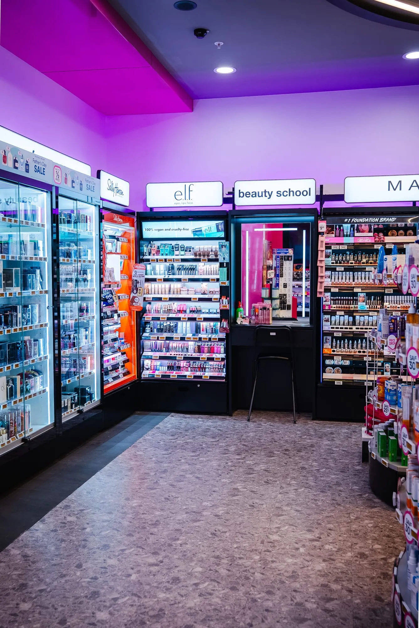 Beauty hall with premium cosmetics fixtures and cove lighting