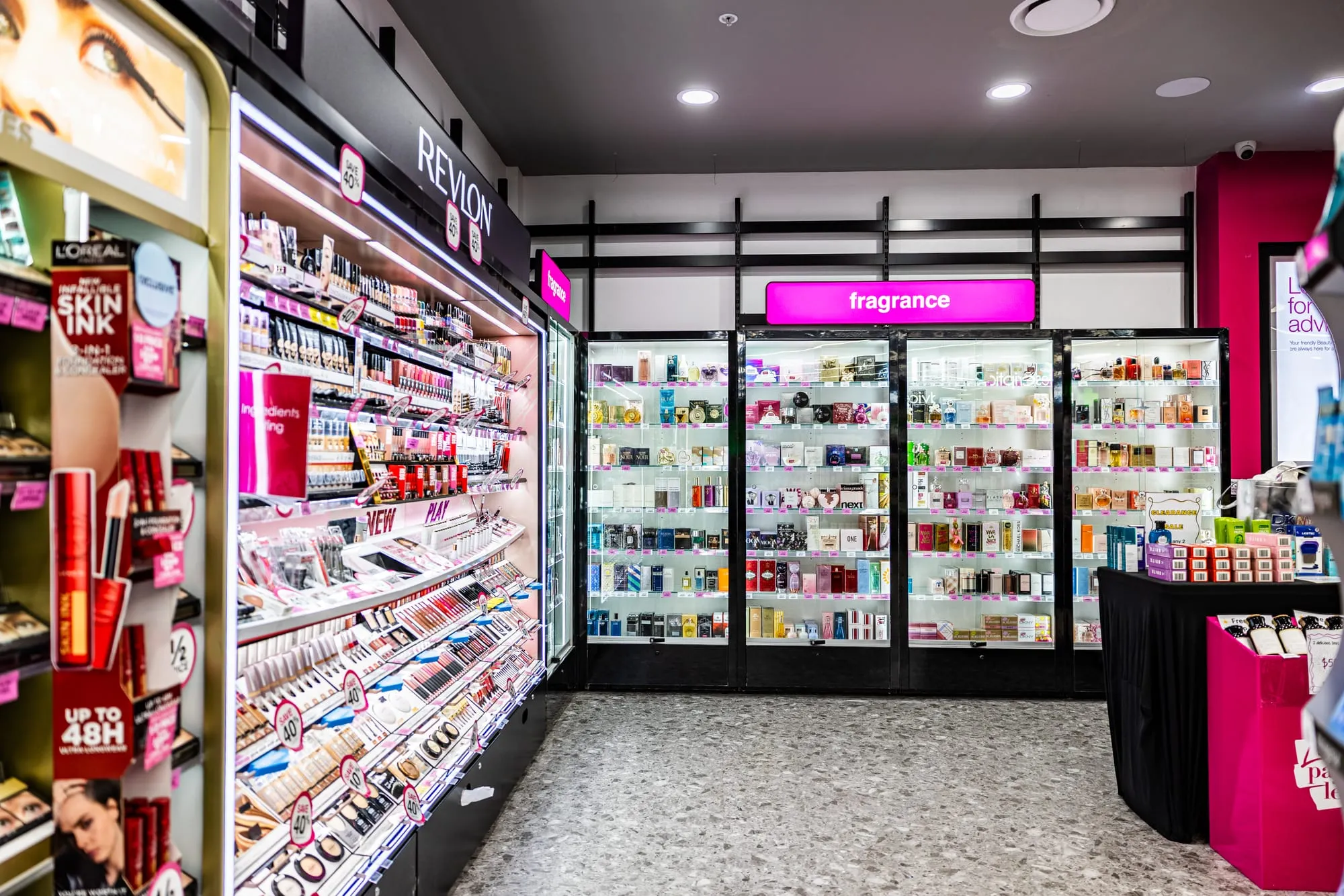 Beauty hall with backlit brand signage
