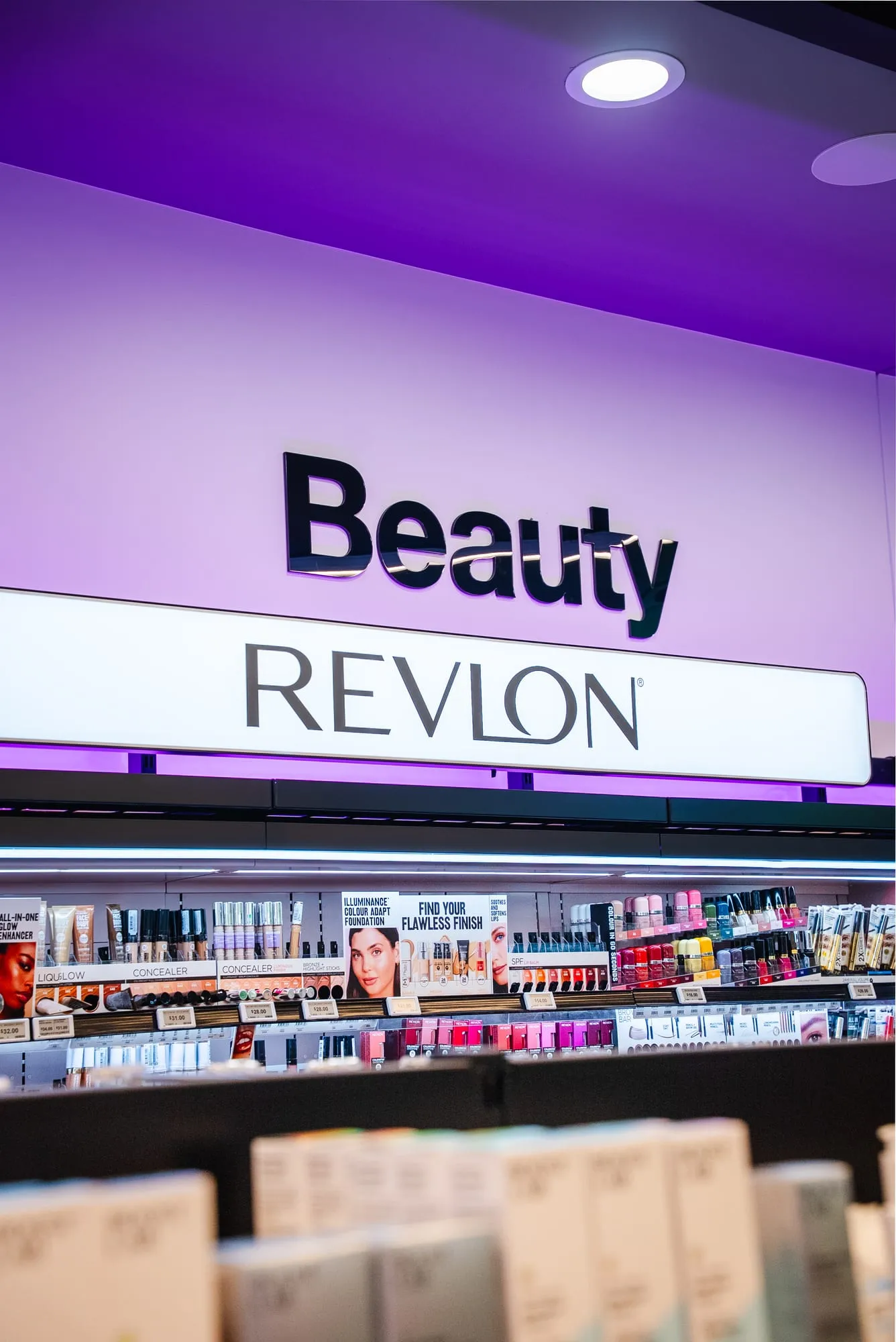 Backlit beauty department signage