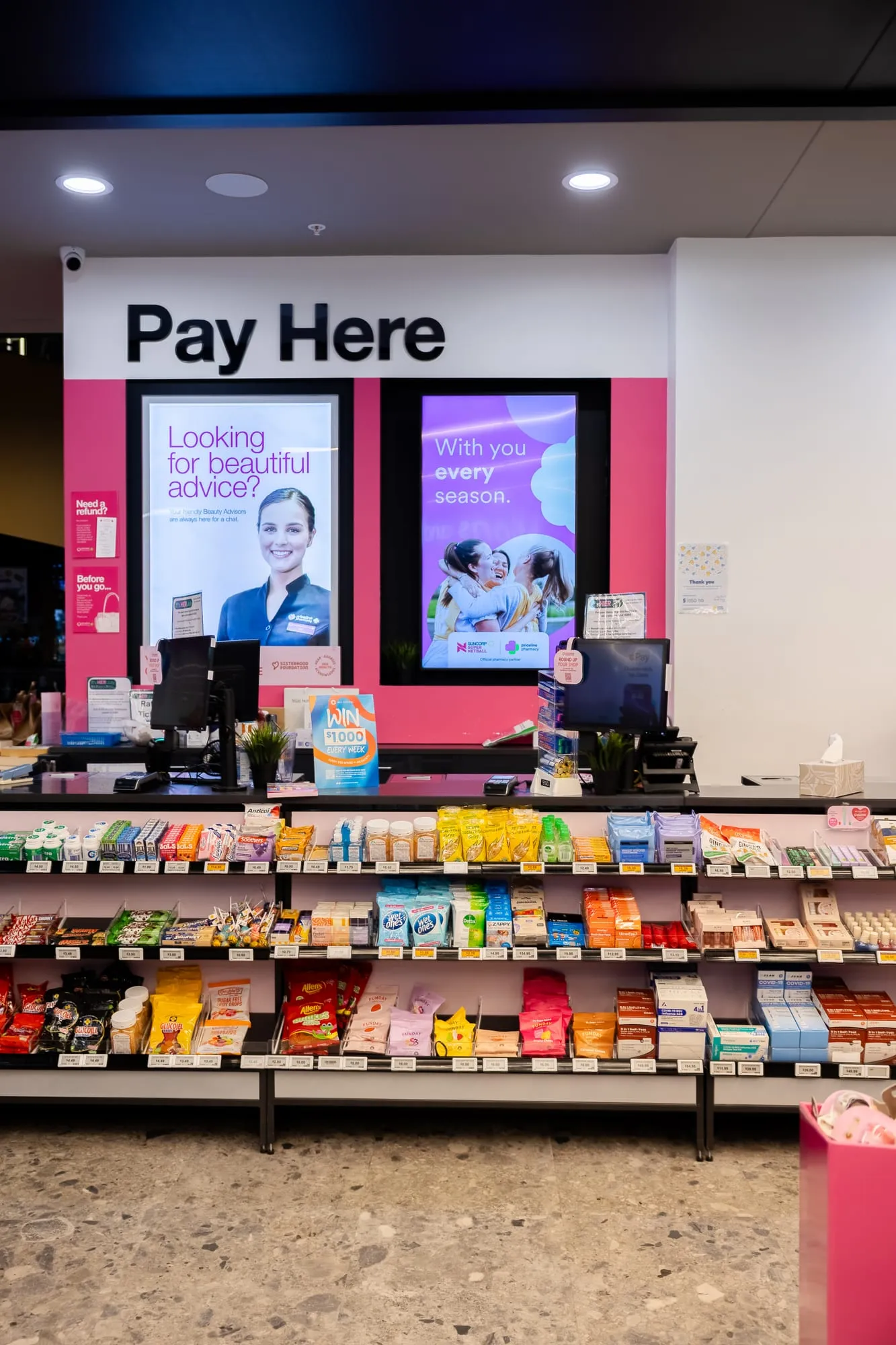 Service counter and custom joinery at the Pay Here point