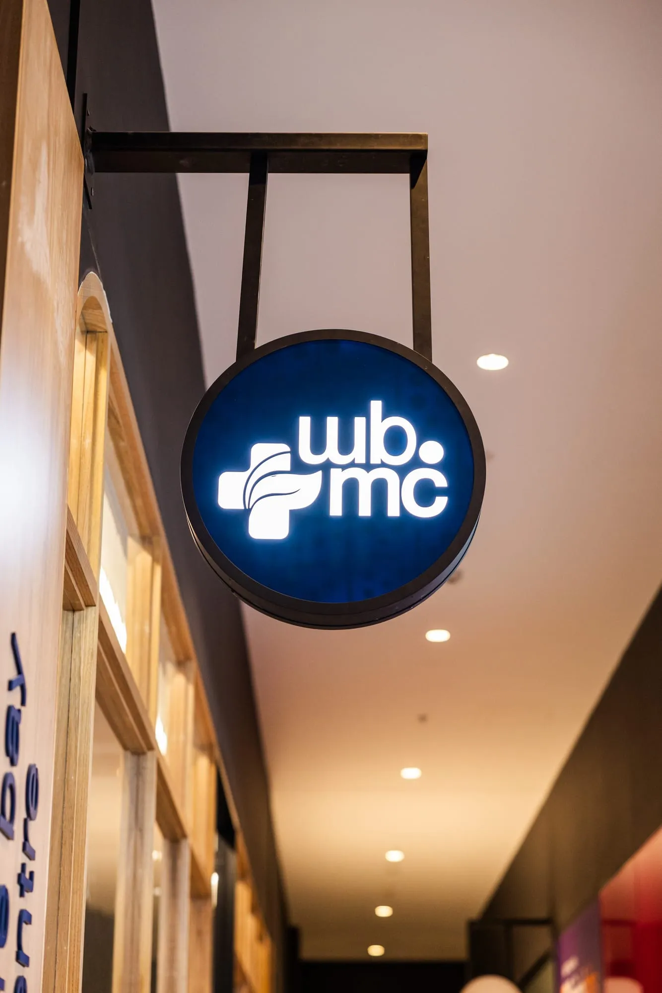 Illuminated Woolooware Bay Medical Centre sign in the corridor