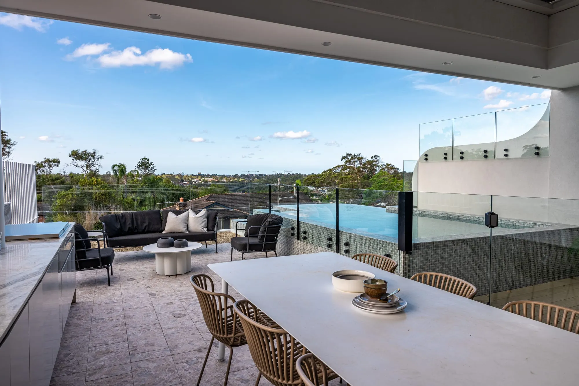 Rooftop terrace and outdoor lounge with a district outlook